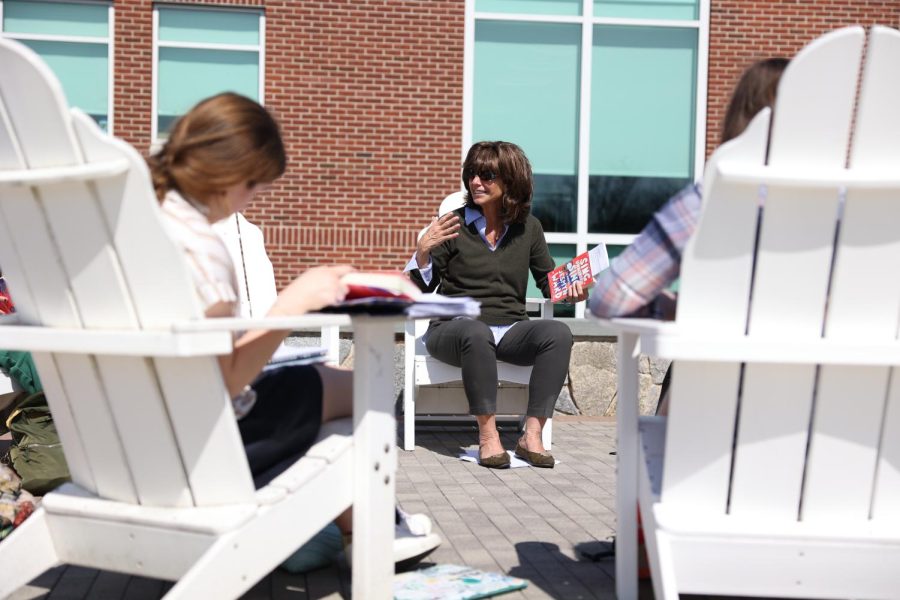 Ms. Dorans Upper School English class took advantage of a beautiful spring afternoon and met outside on the Alumni Plaza

